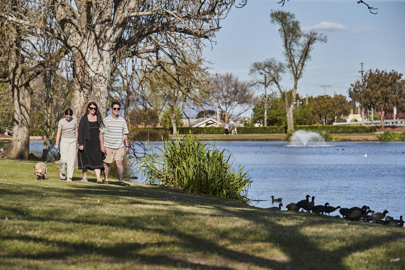 A young family enjoying a walk at Alexandra Gardens in Ararat