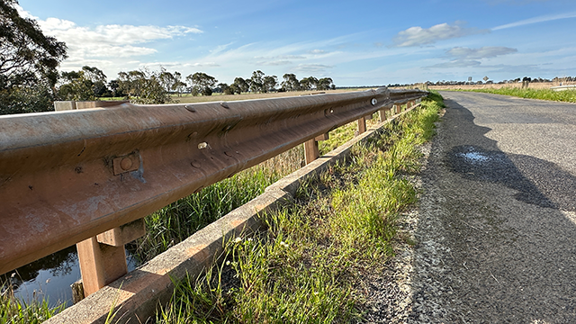 Longshot of a regional road with a bridge